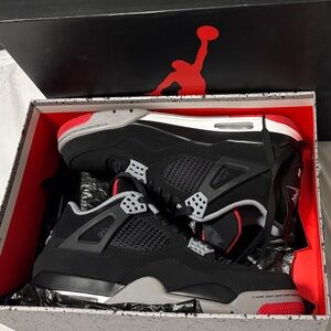 Jordan Black and Gray Sneakers with Red Highlights